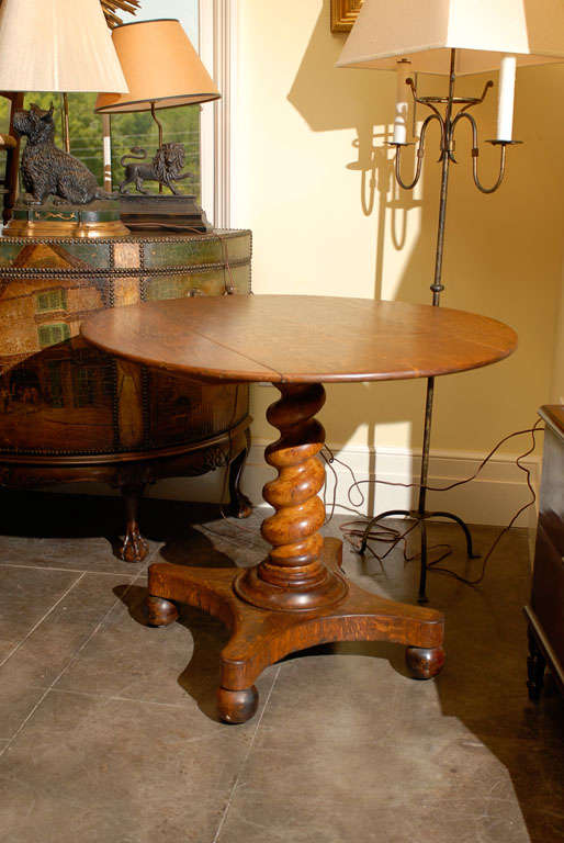 English round pedestal table with Barley twist pedestal.