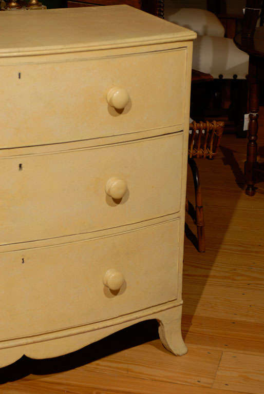 Painted English Early 19th Century Bow-Front Three-Drawer Chest of Pale Yellow Color