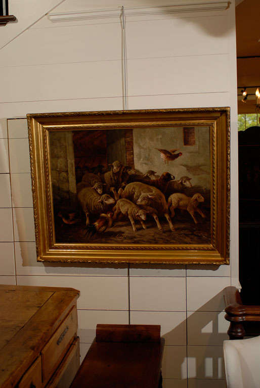 Lovely painting of sheep running out of barn with chickens in gilt frame.
