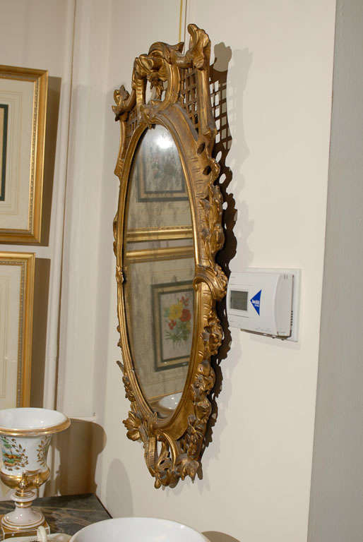 19th Century Oval Gilt-Wood Mirror with Fret Work & Flowers For Sale 1