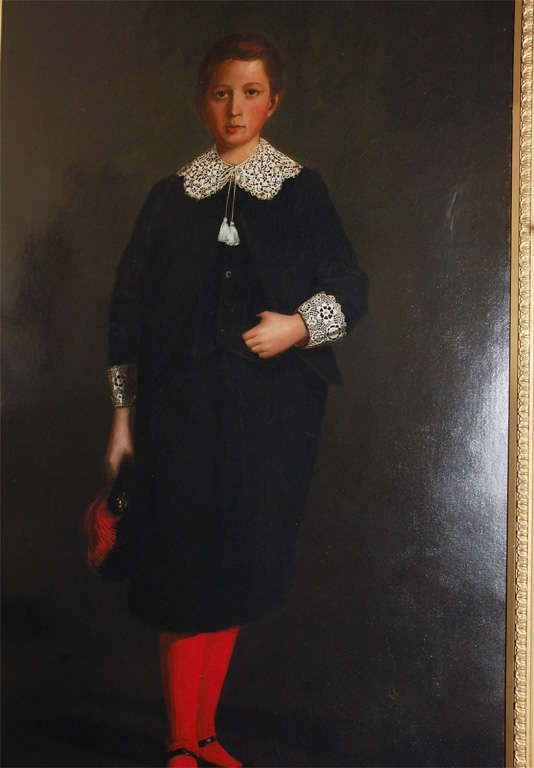 Beautiful, early 19th century, oil on canvas painting of a French noble boy in a luxurious, two-piece, velvet suit trimmed in intricate lace, and a pair of striking, crimson stockings. In his right hand, he holds a beret embellished with a broach