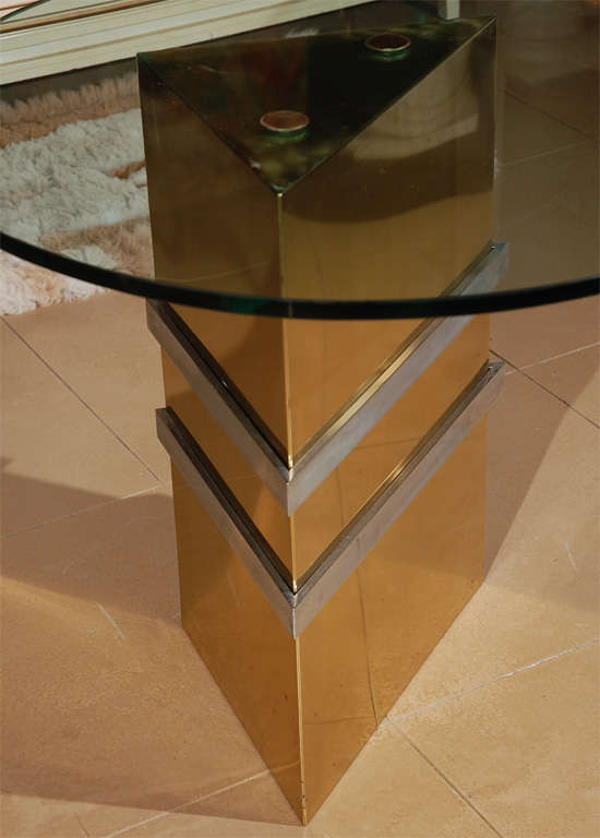 Karl Springer style glass, chrome and brass triangular table.