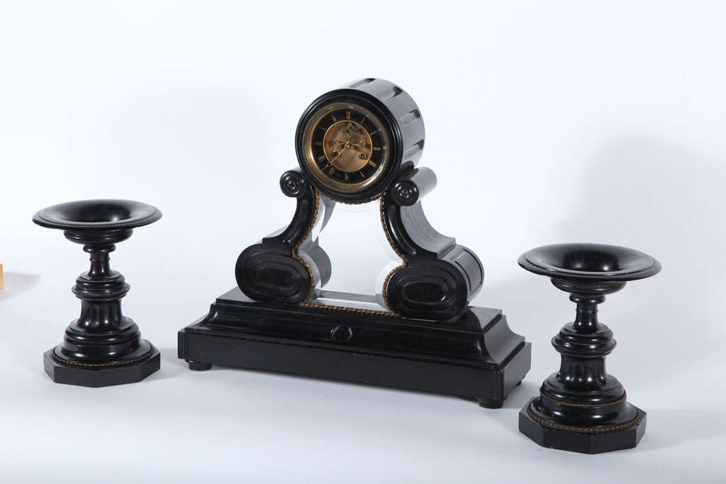 Rare black stone three piece mantle clock set. Steel dial, windup operated.

*Not available for sale or to ship in the state of California.
