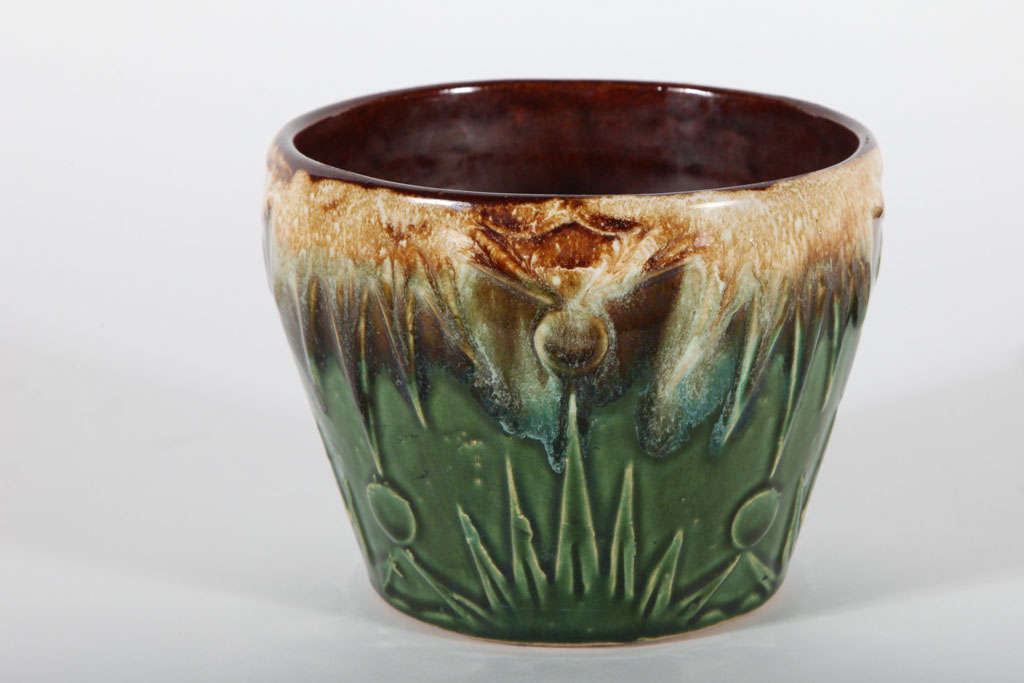 Vintage Jardinière crafted by Robinson Ransbottom Pottery Company also known as RRPC. Sunburst green and brown pattern from top to bottom. This piece is one of four and can be sold as a set.