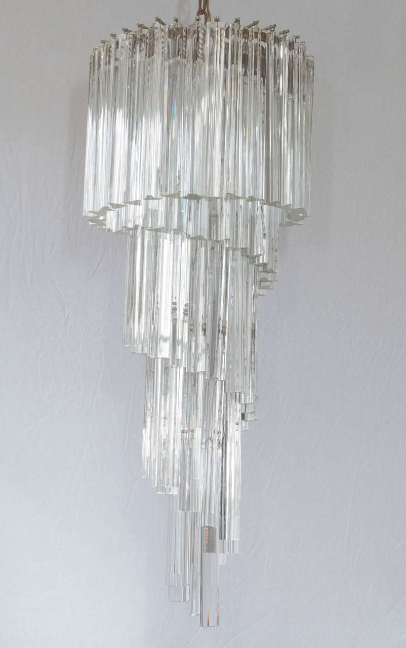 Impressive crystal chandelier by Venini of cascading prisms on a chrome frame.