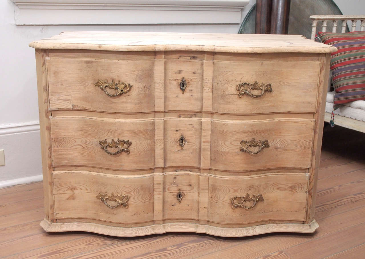 Three-drawer pine chest from Denmark with original hardware.