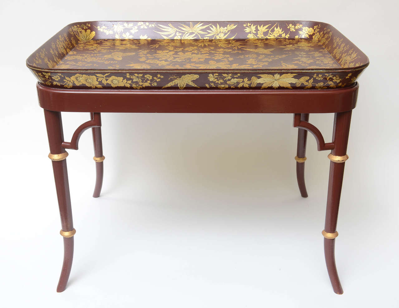 Superbly decorated and rare papier mâché tray table signed by Henry Clay, King St. Covent Garden. Henry Clay, showrooms London 1772-1821, was a patron of the royal family. Listed in the dictionary of English furniture makers pg.176.
A true