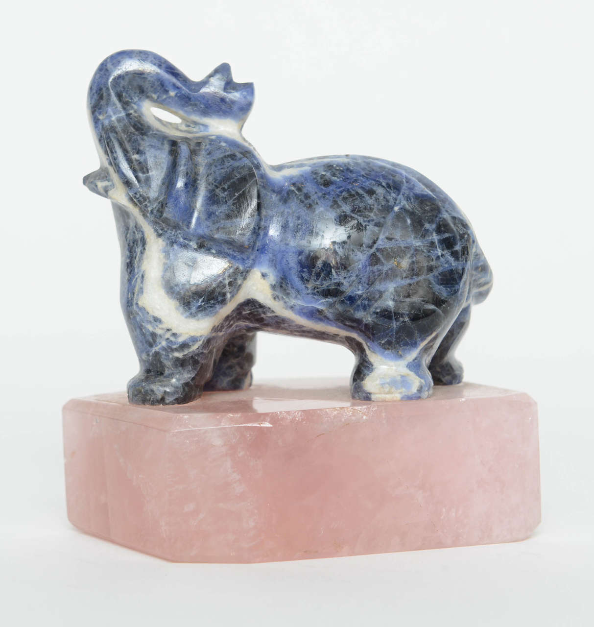 perfect size for a paperweight or just show as an art object.

Sodalite is a rich royal blue tectosilicate mineral widely enjoyed as an ornamental gemstone. Although massive sodalite samples are opaque, crystals are usually transparent to