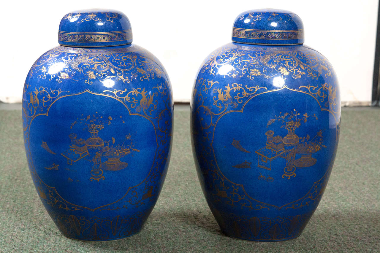 A large pair of Qing dynasty (1644-1912) blue and gold Chinese tops covered jars with a circular blue mark on the bottom, circa 19th century.