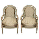 PAIR OF FRENCH ARCHED PIERCED BACK ARMCHAIRS