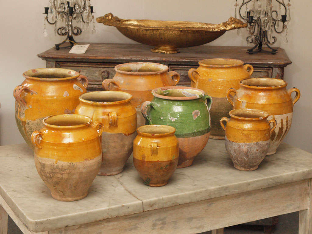 A selection of confit pots of varying sizes;  the tallest being 13 1/4 