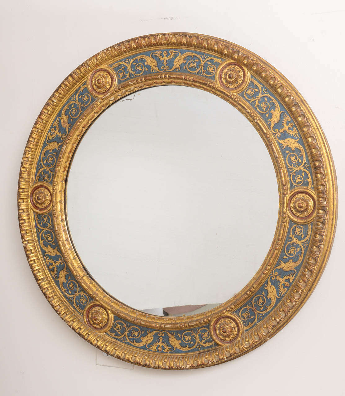 Exquisite Florentine mirror, hand-painted in blues and gold. Beautifully carved, gesso and gilt frame.