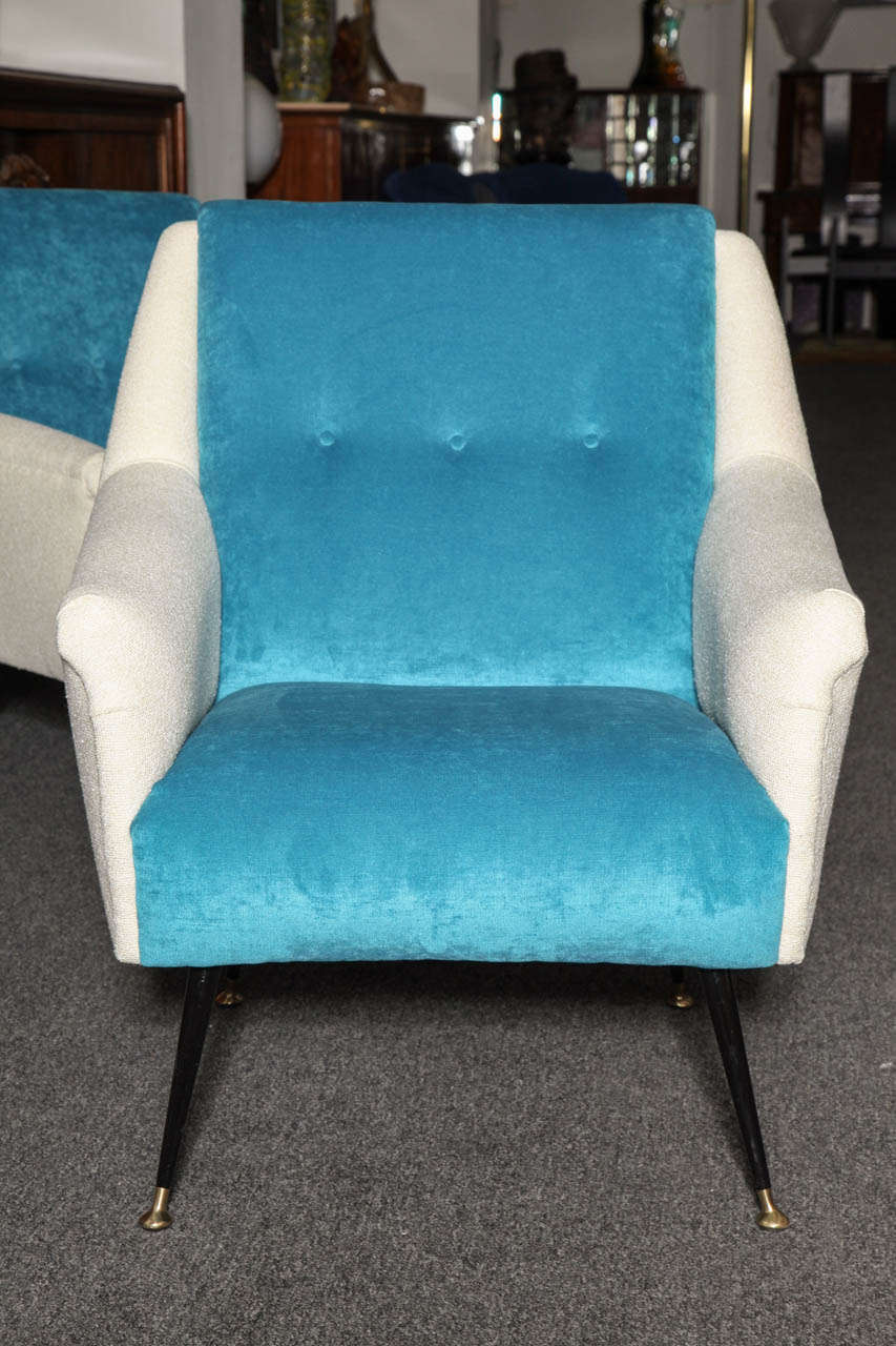 Stylish pair of armchairs designed by Gio Ponti, made in 1955 in Milan.
Unusual angular frame on four steel and brass legs, newly upholstered in teal and white fabric. Bur I do have a second pair that haven't been upholstered yet, so can be done