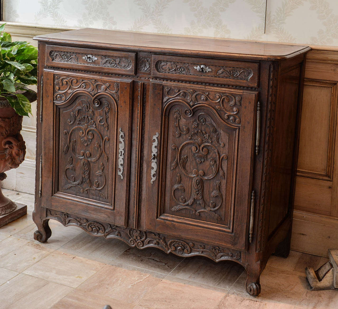 19th Century Carved Oak Buffet, Circa 1860
This is a wonderful rustic piece that will add charm to a mountain house or any informal home.  It is a good height for serving and has lots of storage making it perfect for a dining room but would also do