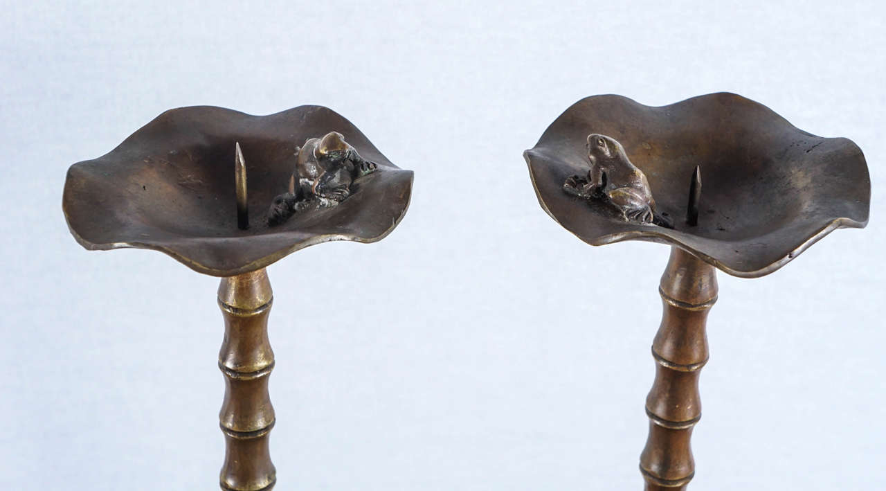 Bronzed 19th Century Tibetan Foo Dog Candle-stands For Sale