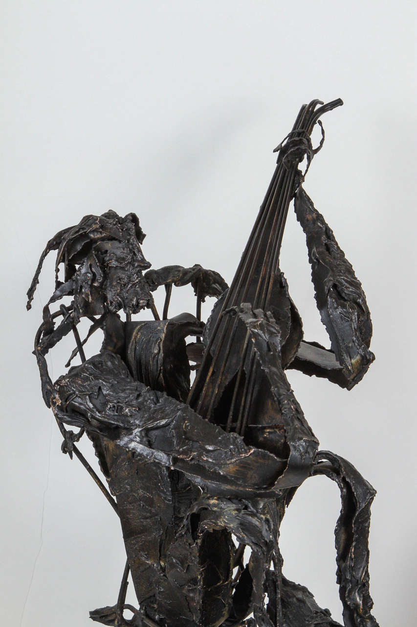 Mid-20th Century Metal Sculpture of Man Playing Guitar