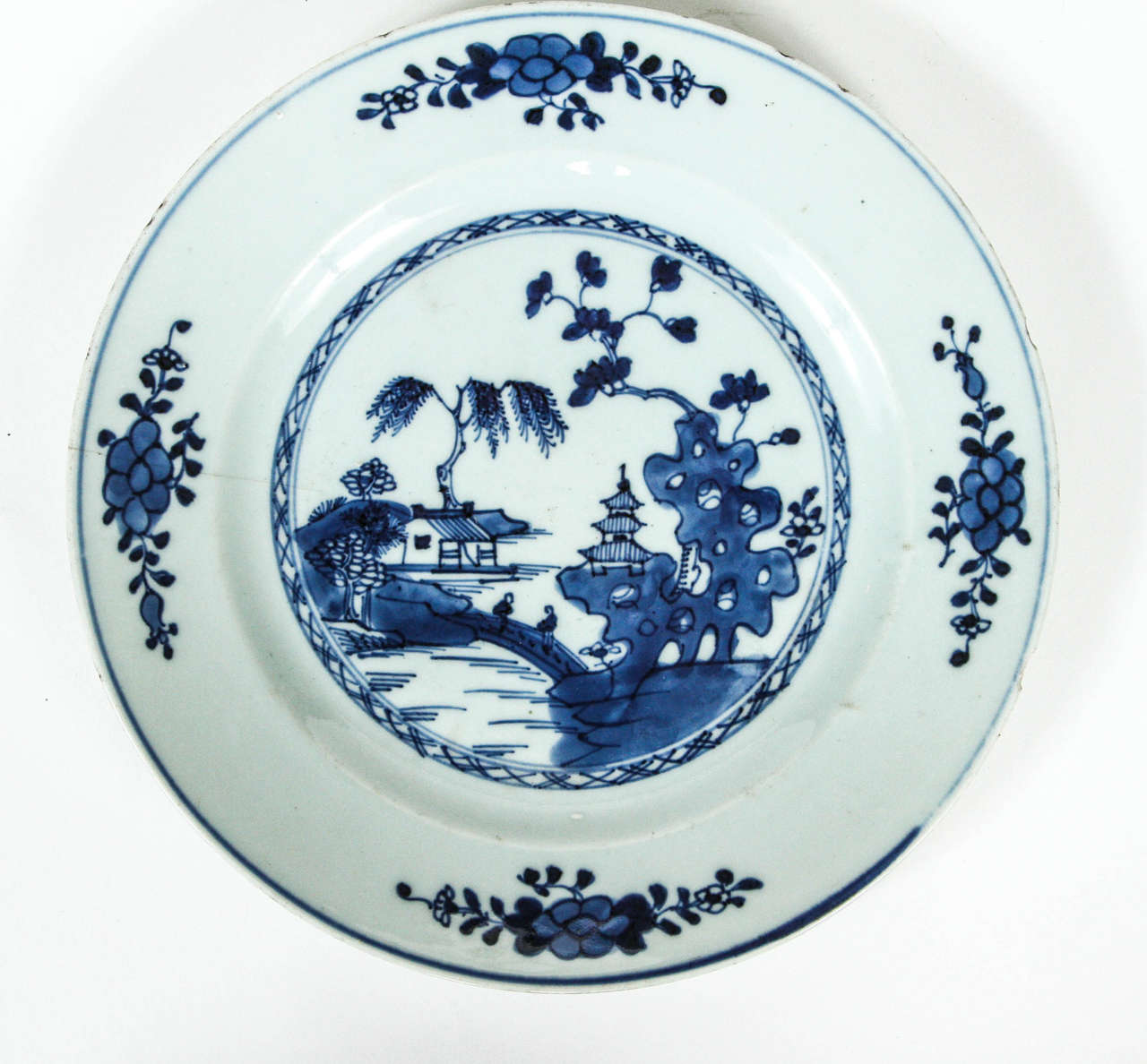 A Chinese blue and white porcelain plate, 19th Century From a collection of ten plates available in assorted patterns.