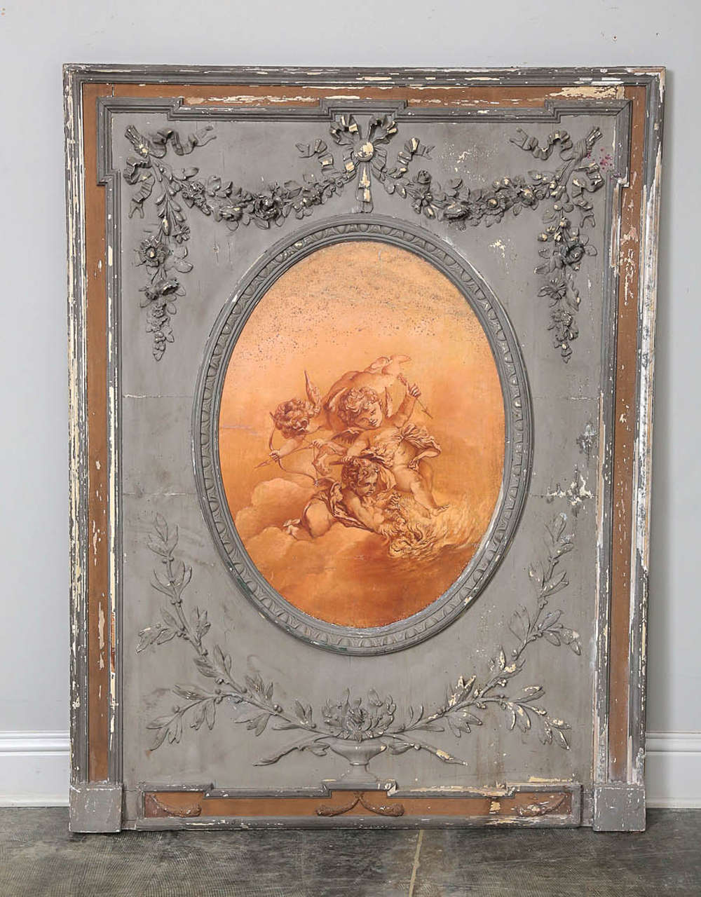 18th Century French boiserie panel with original grisalle painting of Putti; Old paint and gesso.

Established in 1979, Joyce Horn Antiques, ltd. continues its 36 year tradition of being a family owned and operated business specializing in hand