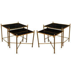 Pair of brass and glass nesting tables attributed to Maison Jans
