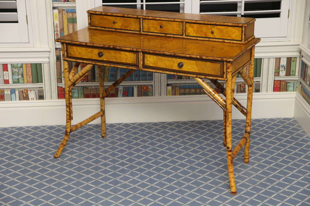 Very Beautiful and difficult to find late 19th Century English Bamboo desk with marquetry on top and 5 drawers.