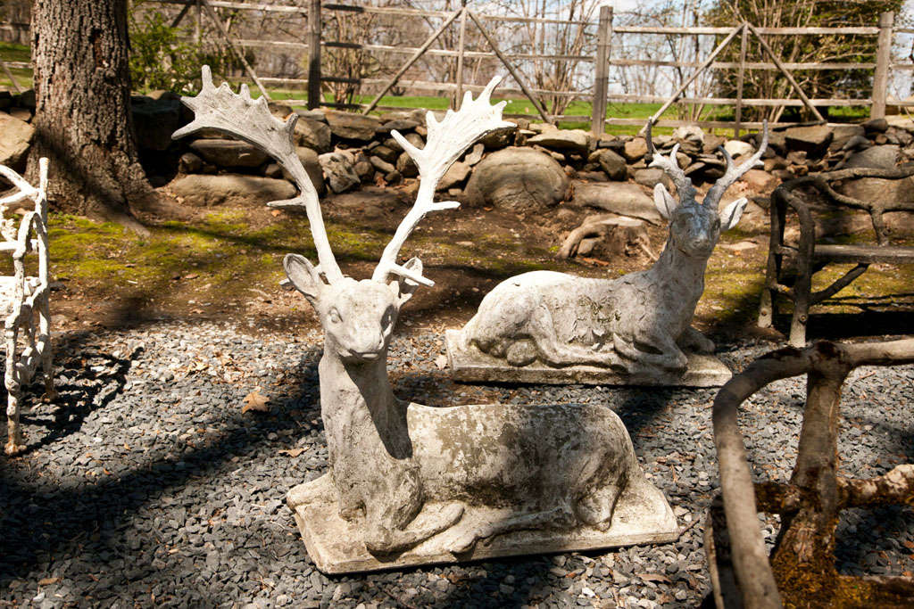 Majestic reclining stag garden ornament with large antlers