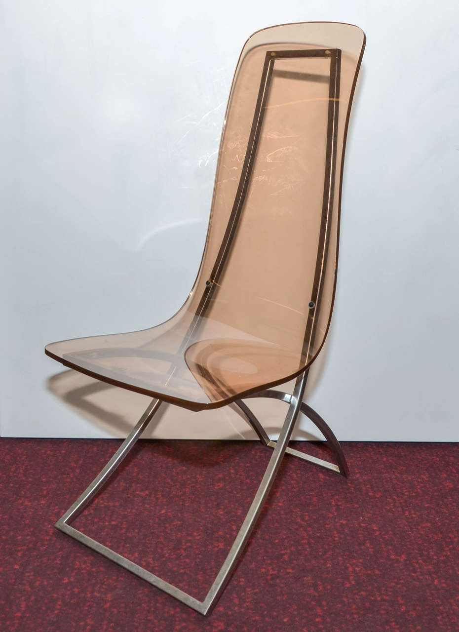 Twelve 1972 chairs by Edmond Vernassa in chromed steel and smoked plexiglass.