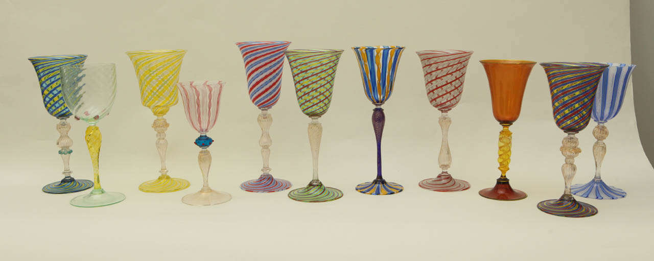 A beautiful and colorful collection of seven Murano glass goblets by various glassblowers. Each goblet is signed on the underside by the maker. Please note that some have been sold. The goblets can be purchased individually for $250 each. The