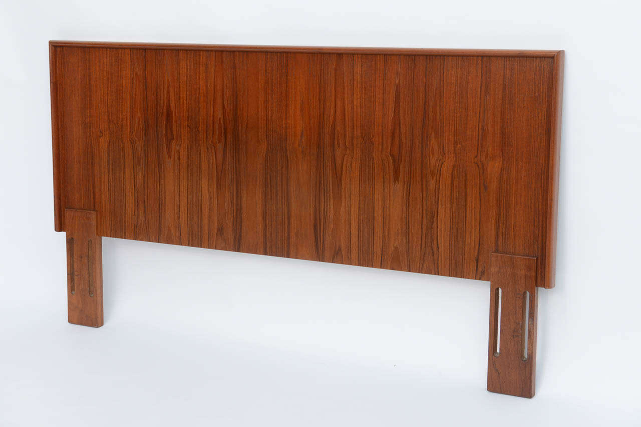 SOLD 1960s, minimalmist in style, this Danish figured teak headboard has a single edge bull-nose style framing.  Queen size headboard. 

Measurements:
65