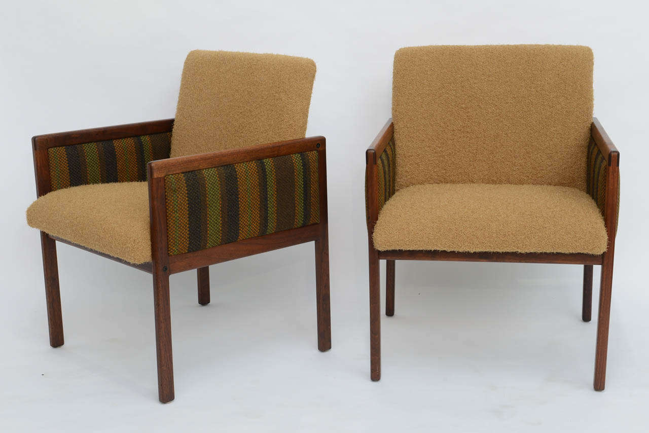 SOLD  Super pair of 1960s Modern Mode (California) walnut armchairs in their original striped woven wool upholstery on the arms and seats reupholstered in a soft golden straw colored highly textured fabric, the color is a bit more mustard than