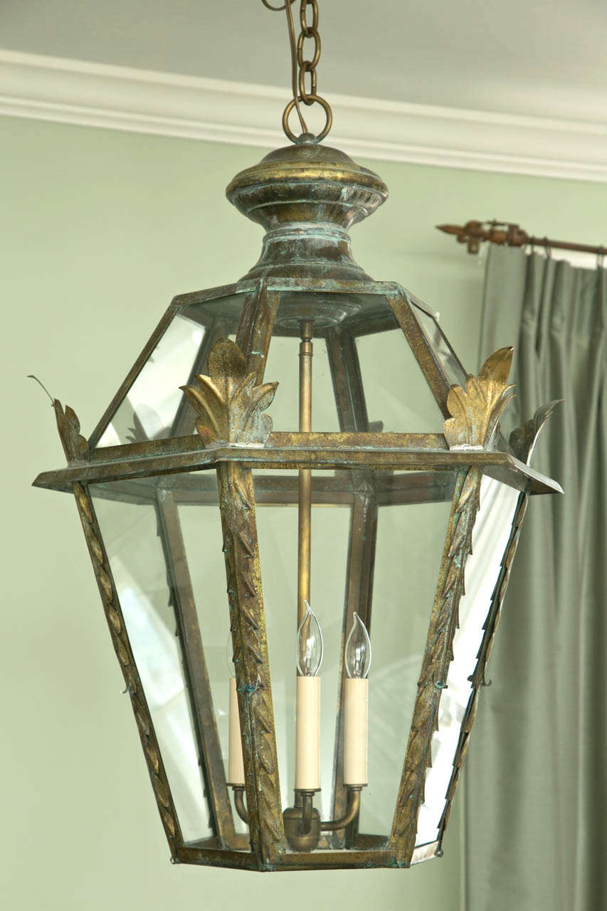 Hand soldered glass encased antiqued brass lantern, newly electrified to code, install ready.