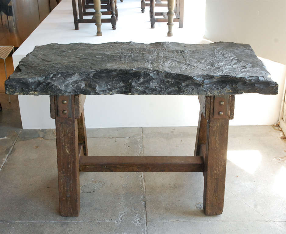 a super handsome table with the largest slab of bluestone we've ever seen. perfect for an entry.
