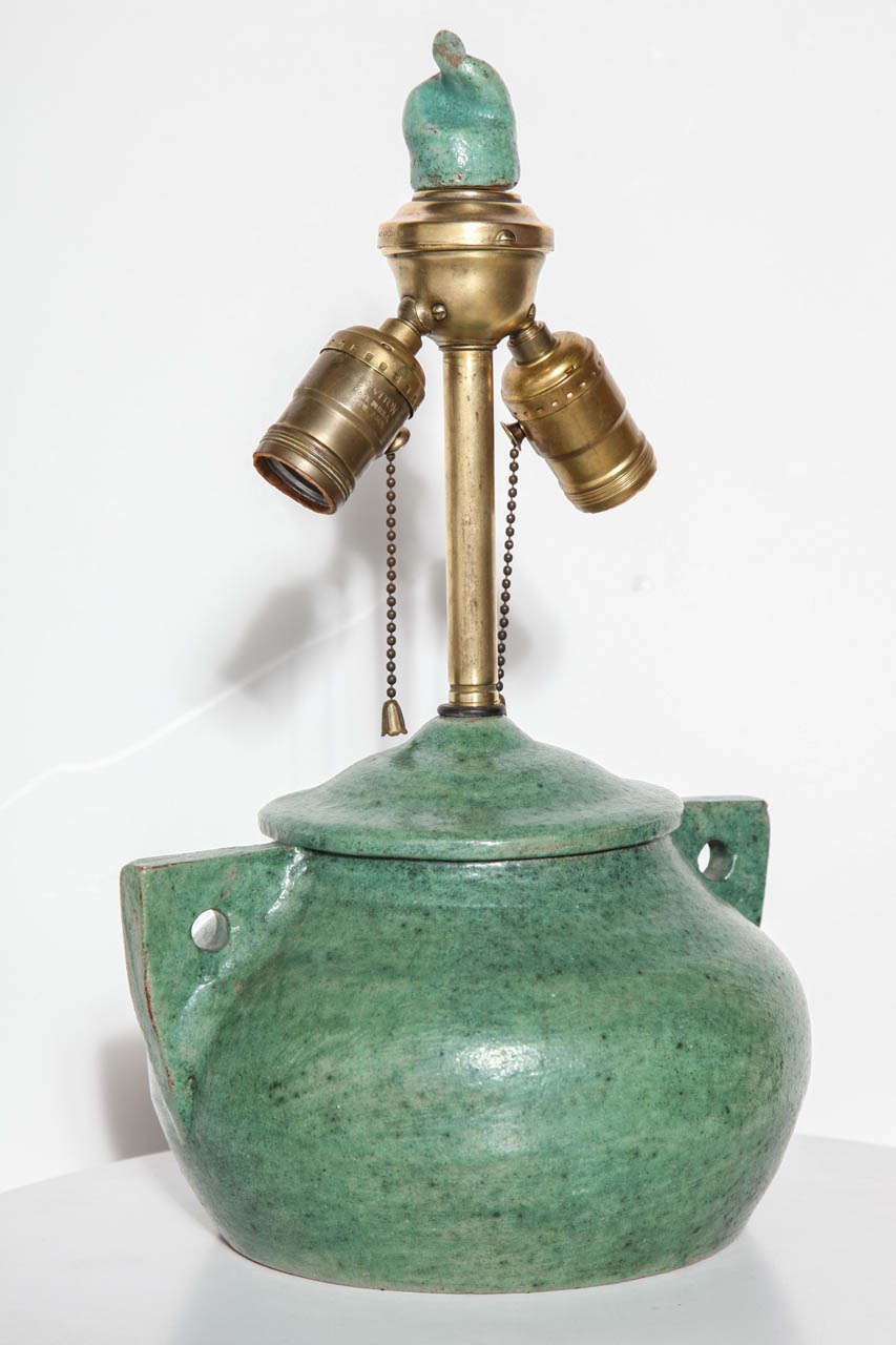 Signed Frey Pottery Pennsylvania Spring Geen Arts & Crafts Ceramic Table Lamp, Circa 1920. Featuring a low, wide, squat Jar shape, circle handle details, a satin Light Forest Green glaze, Brass neck, double sockets, two pull chains and the original