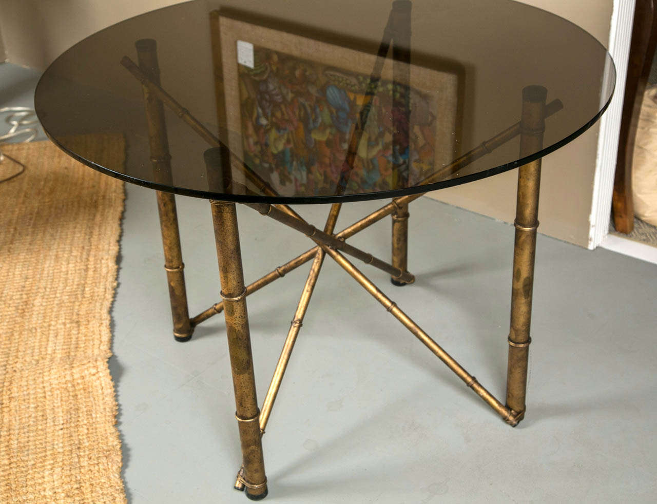 Mid Century Faux bamboo  table with smoked glass top.