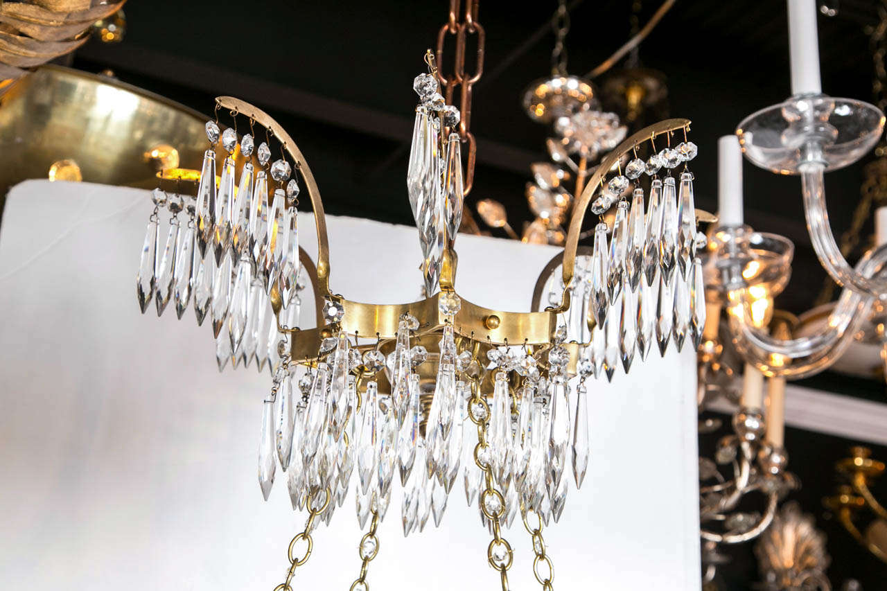 Mid-20th Century Pair of French Gilt Bronze and Crystal Chandeliers For Sale