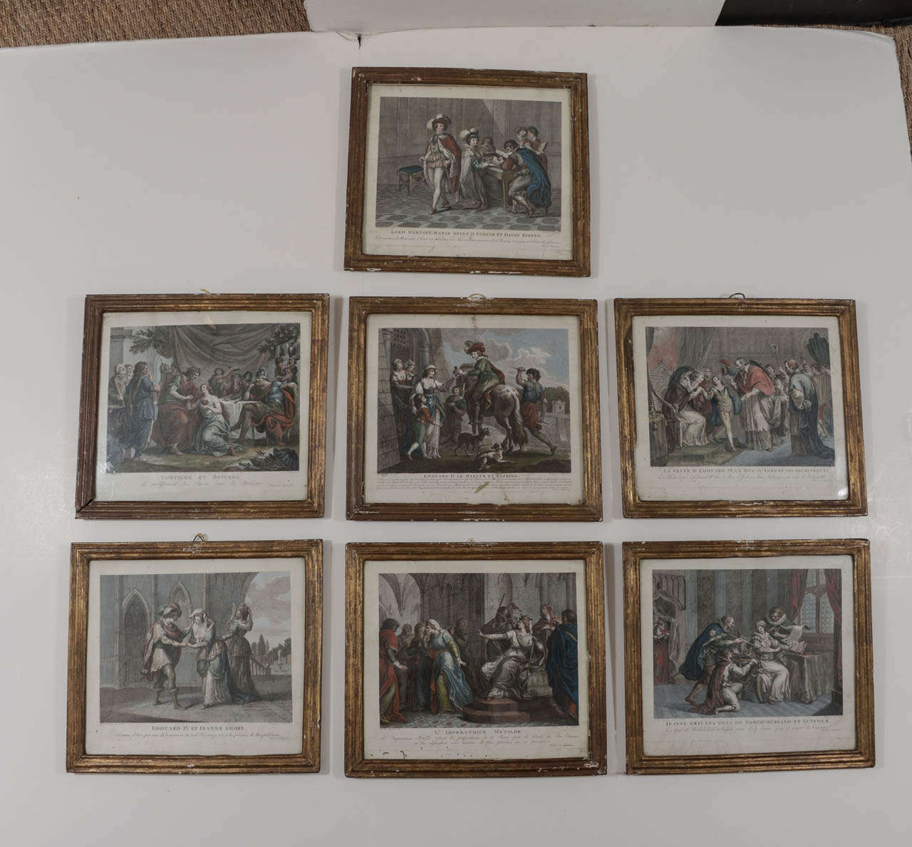 This set of seven 18th Century French Engravings are remarkable. Hand colored, depicting different historical meetings of French Nobility. They still have original gilded frames and glass.