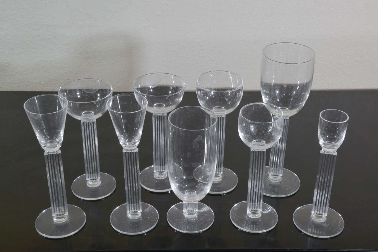 Collection of 9 pristine examples, by Walter Dorwin Teague and Edwin Fuerst for Libbey.

Debuted at the 1939 NY World's Fair.

Most etched with the Libbey acid-stamp.

MEASUREMENTS:
Various bases, either 2 5/8