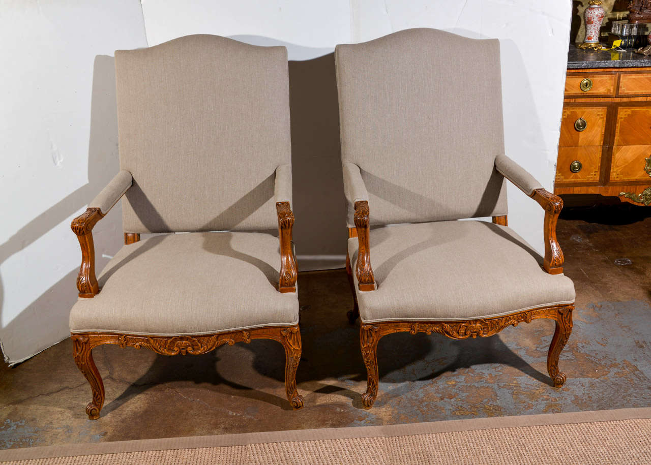 Pair of Louis XIV style armchairs upholstered in heavy taupe linen.