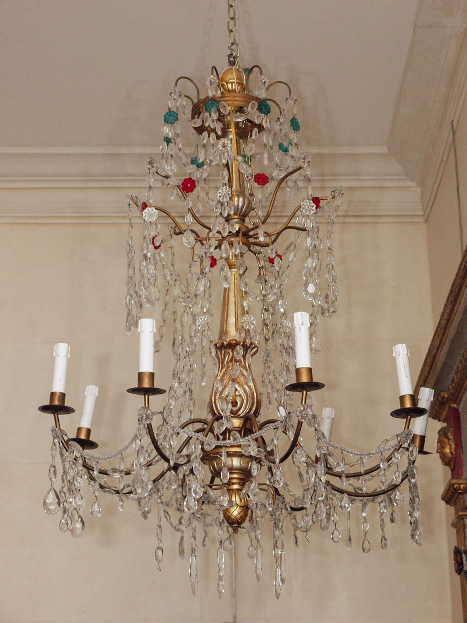 Italian gilt wood and crystal eight light chandelier with crystal rosette accents, electrified