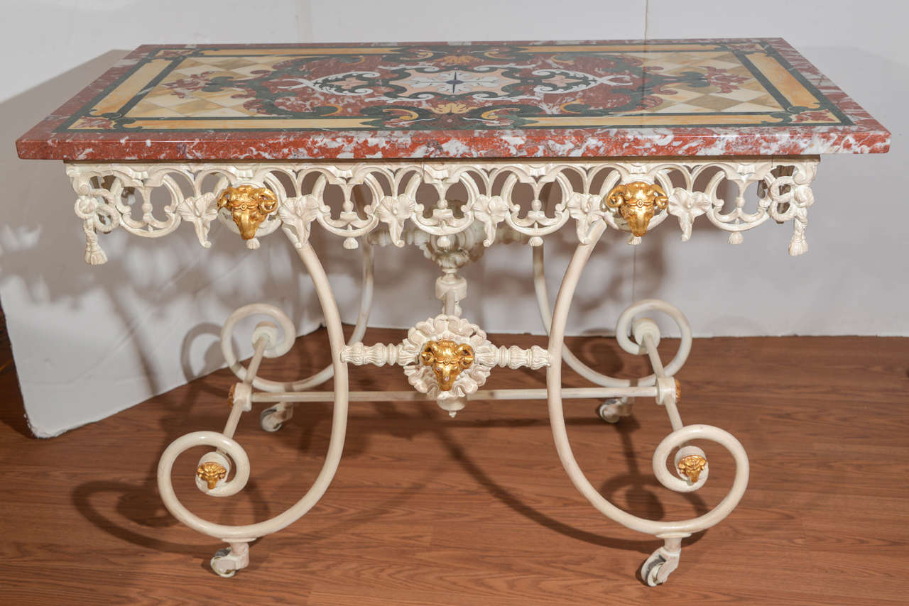 Rare 19th c French painted rod ion bakers table with bronze rams head design. Italian Scaliola marble top