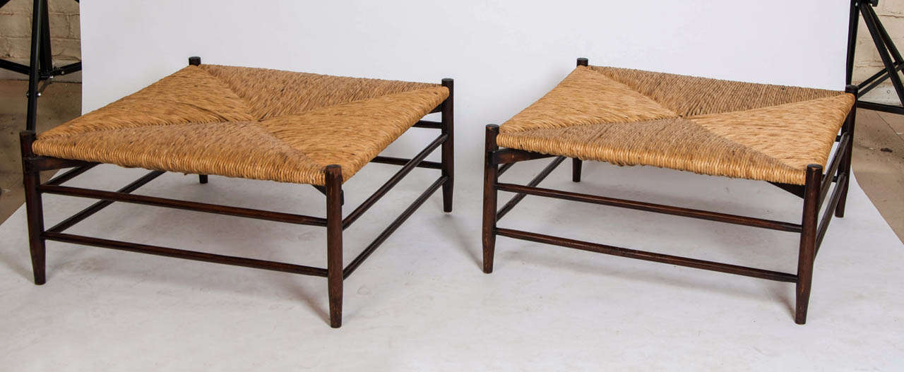 These large stools are 70 cm square . Made in around 1900, the woven rush seats are recent replacements.