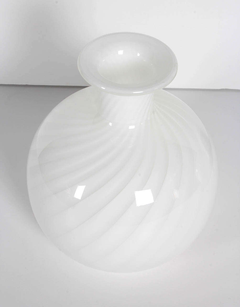 A pair of white swirl Murano vases by Seguso Vetri d'Arte. Can be purchased individually.

Left: 8