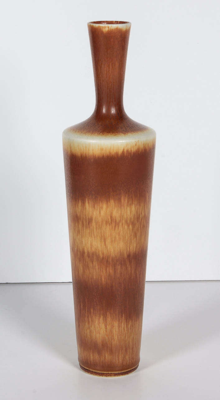 A lovely vase by Berndt Friberg with an amazing haresfur glaze that perfectly demonstrates his amazing glazing expertise. Incised signature and maker's mark on bottom.