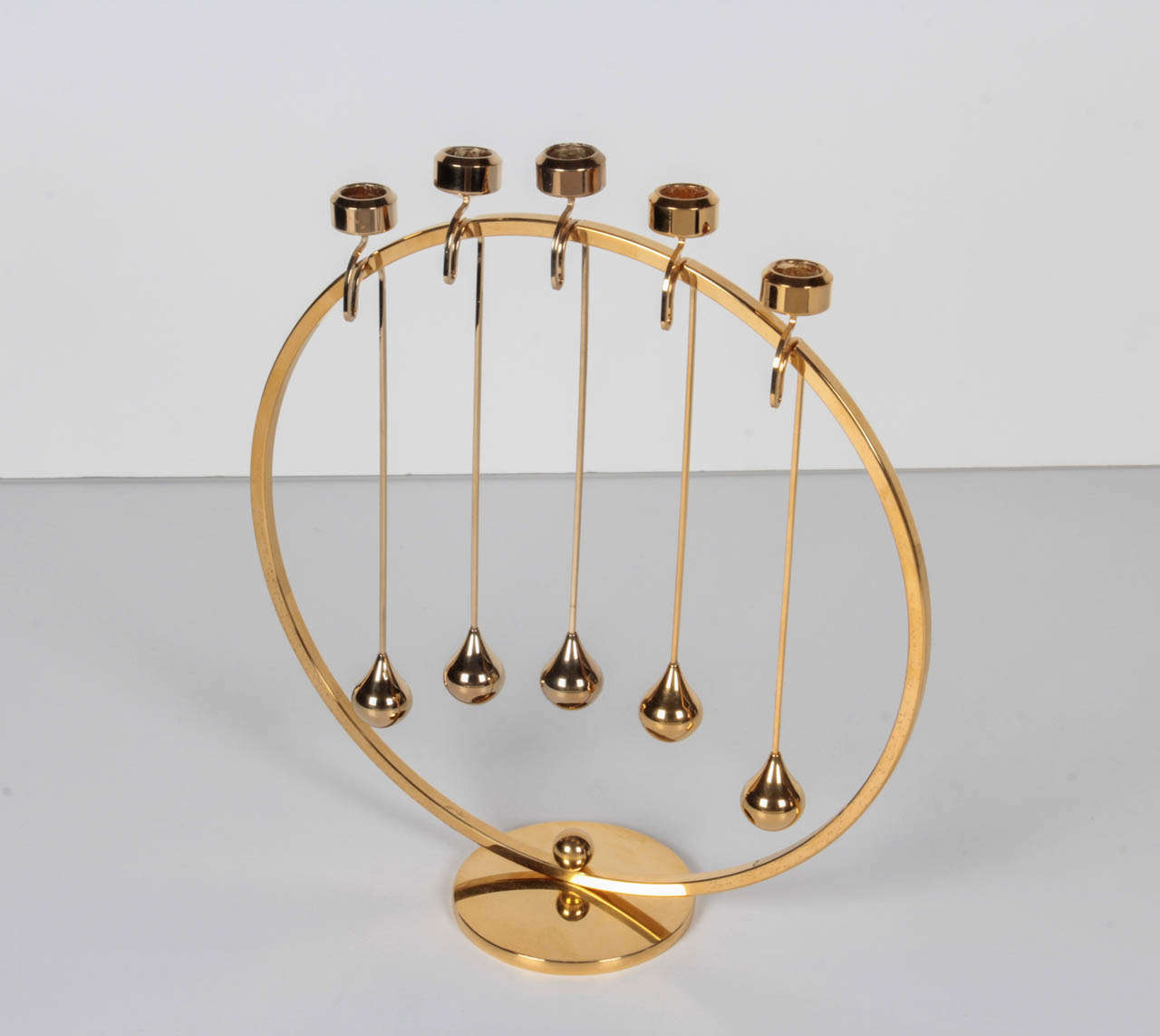 Mid-20th Century Sculptural Brass Pendulum Candelabra