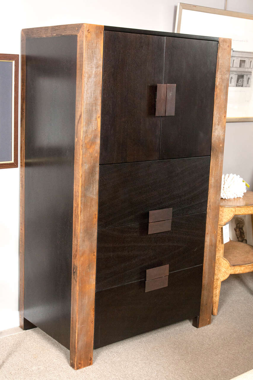 Ebonized cabinet with reclaimed Brazilian wood. Top doors open to reveal an adjustable shelf with opening in back for electrical cords.