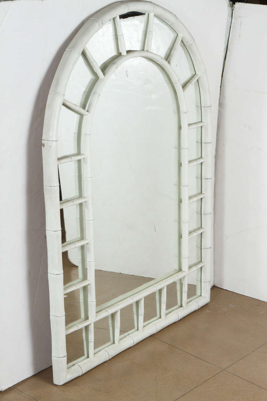 Decorative chinoiserie lattice faux bamboo mirror with open fretwork inset frame painted matte white.