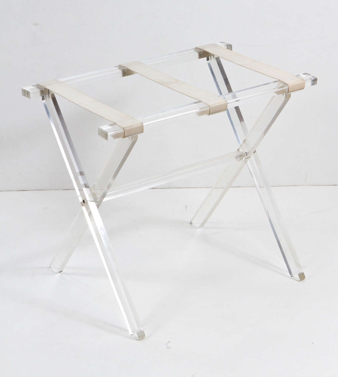 Scheibe folding lucite luggage rack with white leather strapping