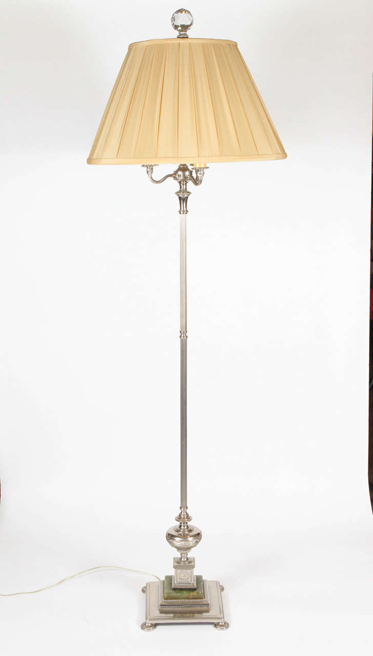 1930s floor lamp with polished nickel finish and green marble at base. Newly rewired with four lights and new custom silk shade with large crystal finial.