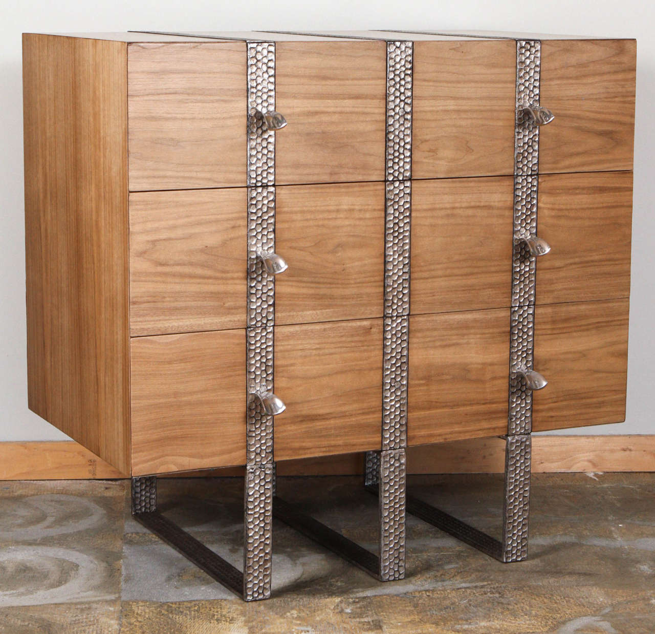 Paul Marra three-drawer chests with inset metal band shown in bleached walnut and embossed steel, mitered edges. As shown limited.  
Visit the Paul Marra storefront to see more furnishings and lighting including 21st century