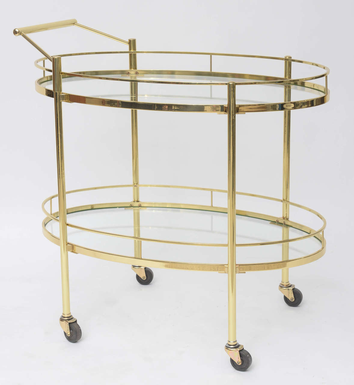 1960s French drinks trolley in solid brass. Professionally polished and lacquered.