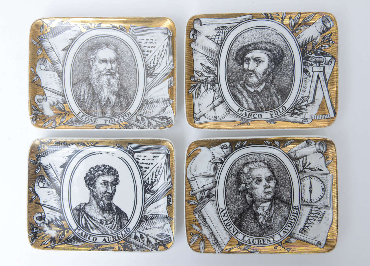 A collector's group of Mid-Century Fornasetti vide poche / catch-alls featuring transfer-printed historical personages on gold-plated backgrounds. Items are priced and sold individually, not as a group. The Leone Tolstoi piece is no longer